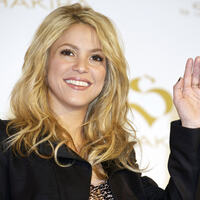 36530_celebrity_paradise_com_TheElder_Shakira2010_06_22_photocallforSbyShakira11_122_1101lo.jpg