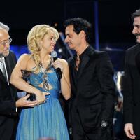 Shakira-receives-the-Person-of-the-Year-Award-from-Neil-Portnow-Marc-Anthony-and-Luis-Cobos-in-Las-Vegas_1.jpg