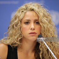 489546748-singer-shakira-speaks-during-a-press-gettyimages.jpg